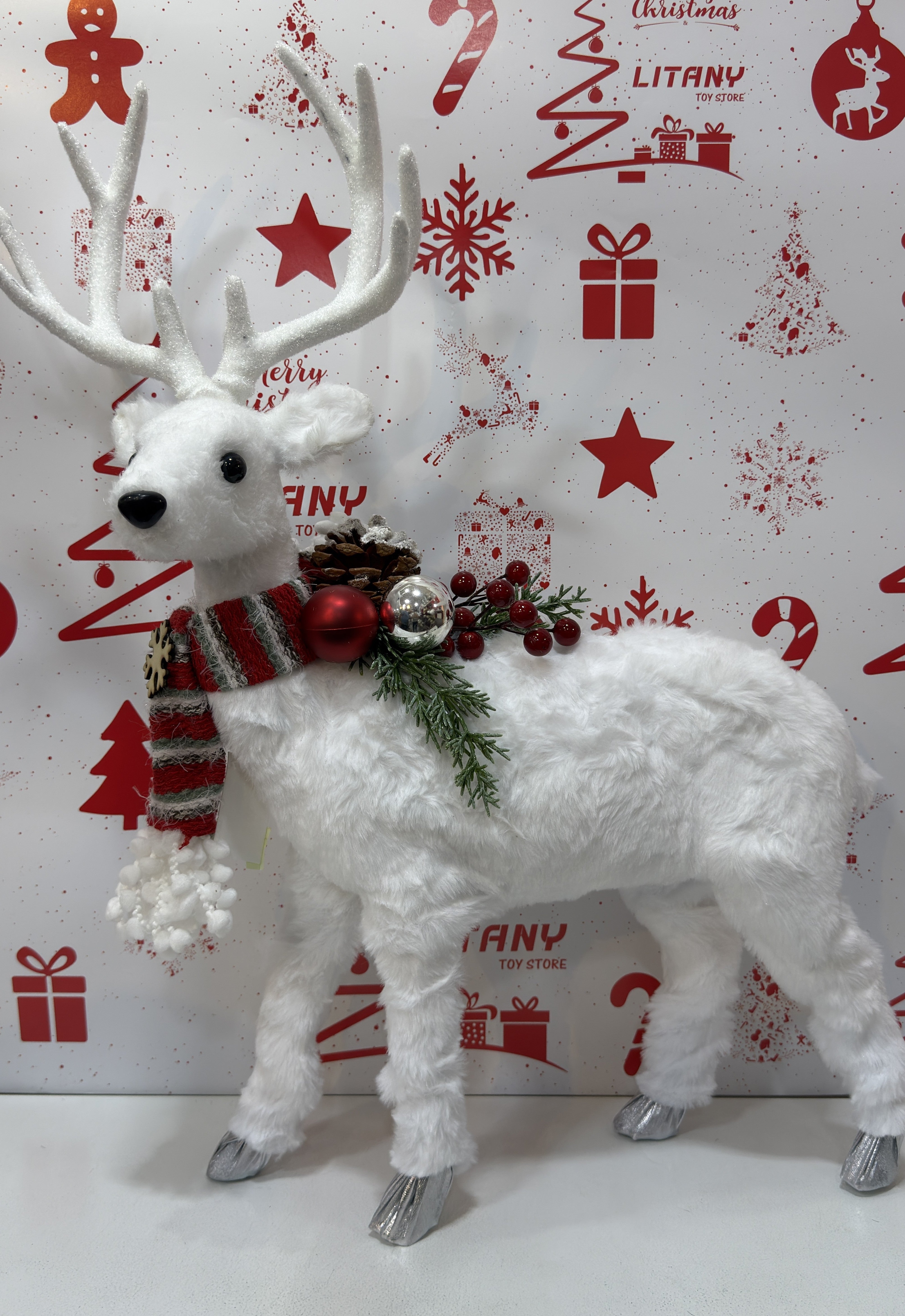 White Christmas Reindeer Decoration with Greenery 60cm